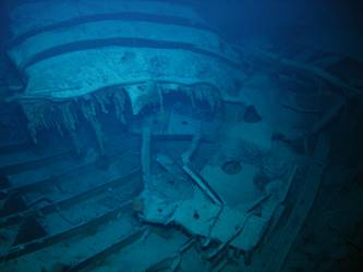 Large pieces of twisted steel plate and ribs on seabed